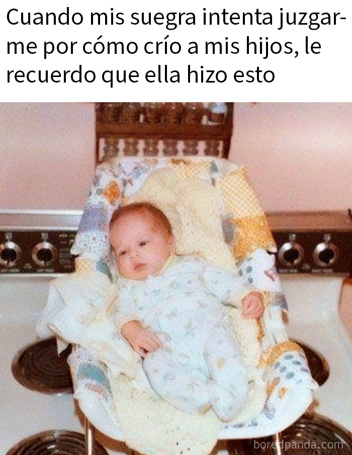 Bebé acostado en estufa con mantas, meme divertido sobre madres y la crianza absurda de los hijos.