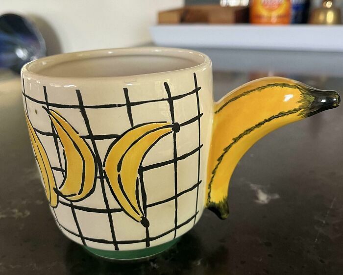 Taza creativa con mango en forma de plátano en fallos de diseño divertidos